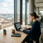 Laptop_on_wooden_desk_202608211635